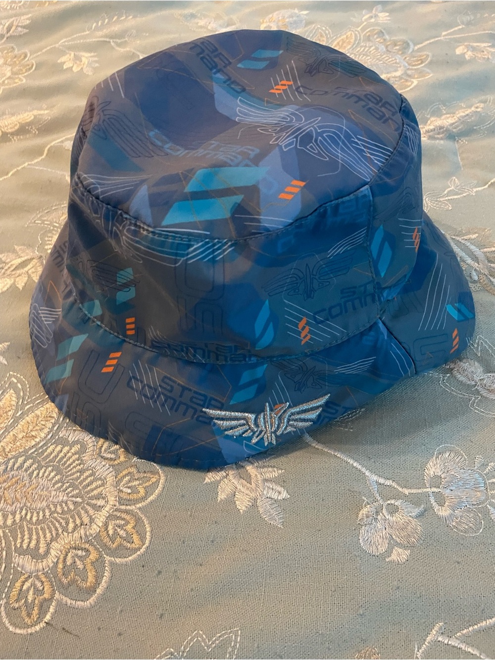 Disney Blue Patterned Bucket Hat with Teal and Orange Accents